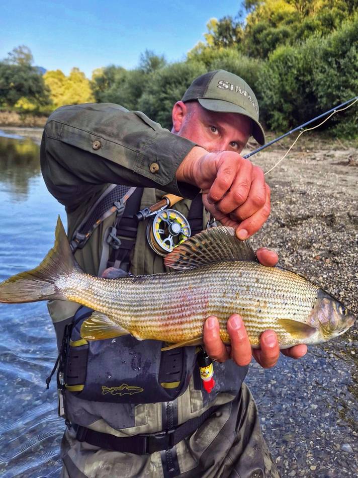A guest showing off his grayling's dorsal fin