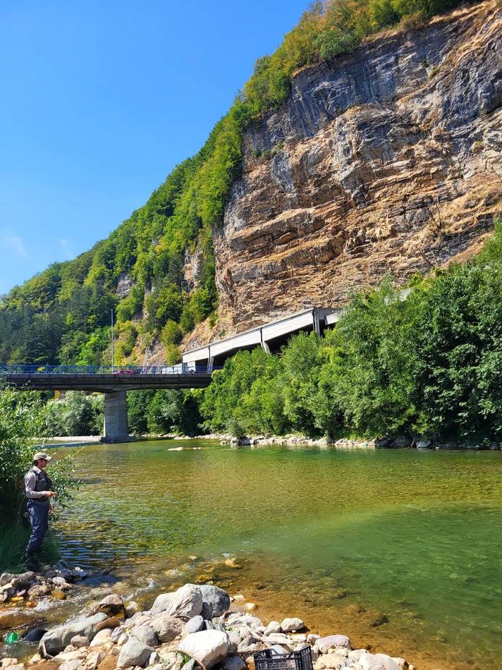 Fishing beneath the bridge on the Tara
