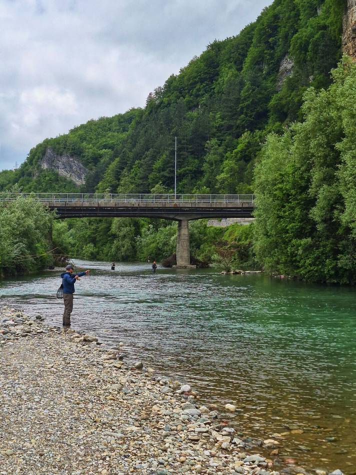 Anglers sharing a run on the Tara