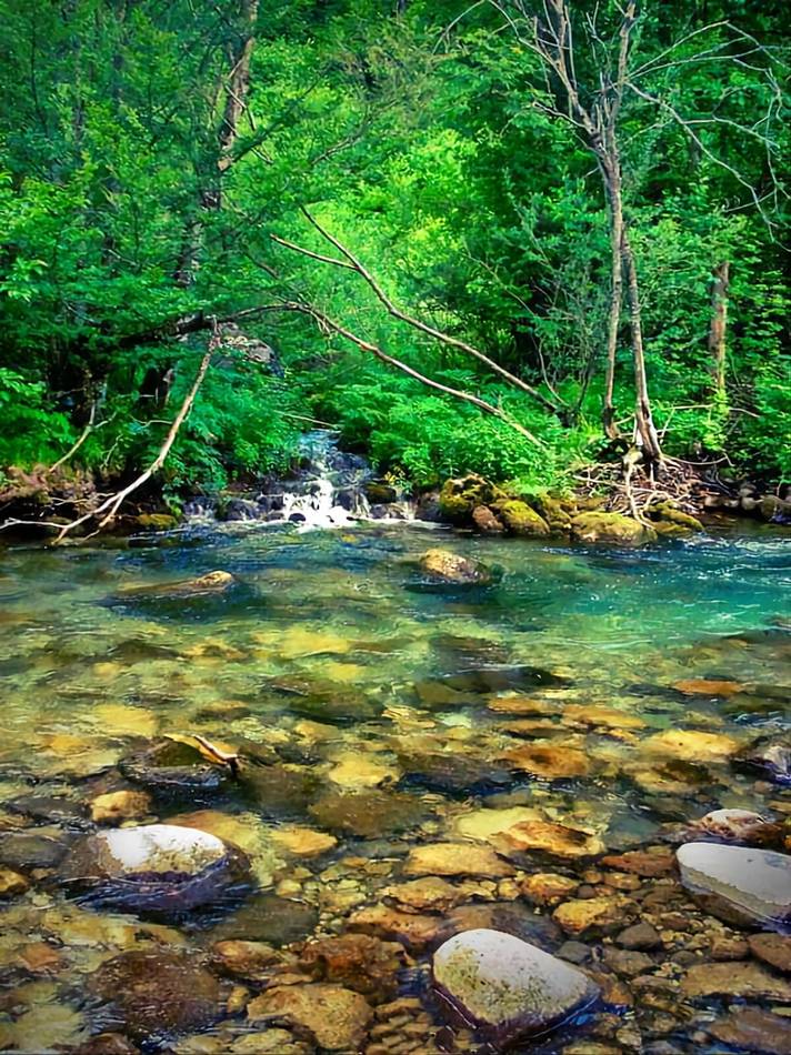Wading the Tara beneath the mountains